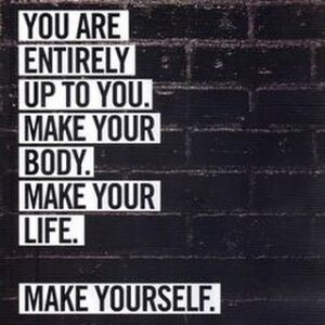 Quote against black brick wall: You are entirely up to you. Make your body. Make your life. Make yourself.